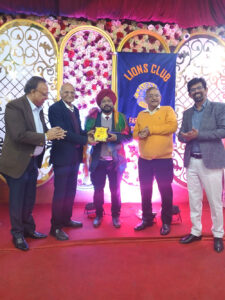 Lions Club Faridabad District 321- A1 felicitates its best member.