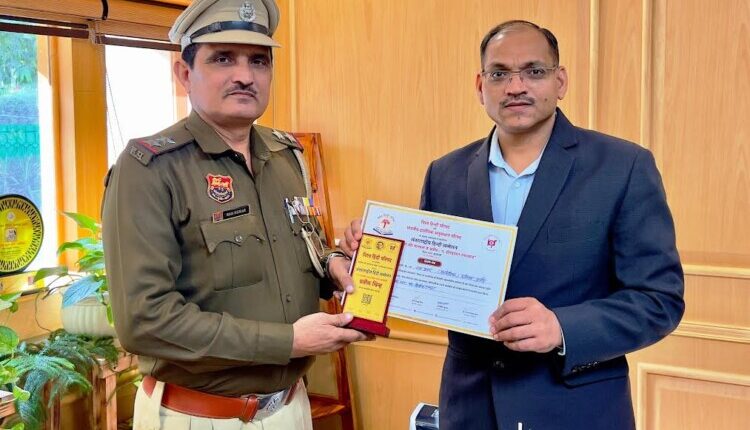 Sub-Inspector Ram Kumar recited three poems at the International Hindi Conference.