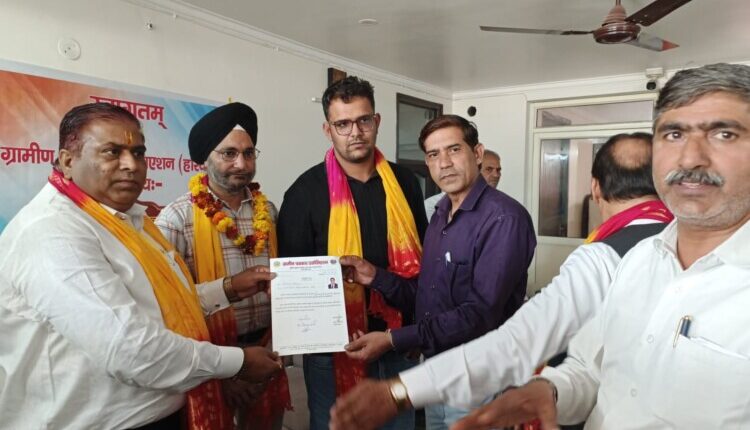 Ankit Malik inaugurated the eye check-up camp organized by the Rural Journalists Association by cutting the ribbon.