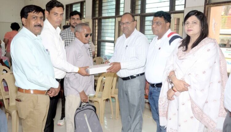 District Red Cross Society Faridabad distributed artificial limbs and assistive devices to the disabled and senior citizens.