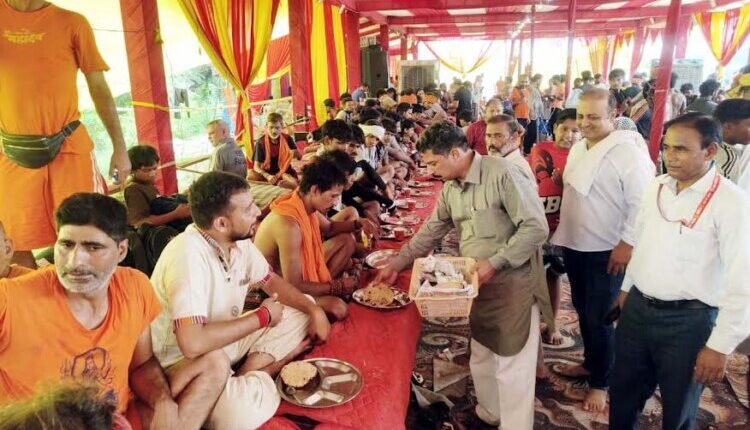 Worship of Lord Bholenath at the Kanwar service camp; *Prasad* distributed to Kanwariyas.