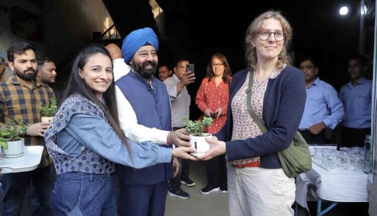 German officials captivated by Victora’s initiative: Flowers offered at temples now spreading fragrance alongside creating employment
